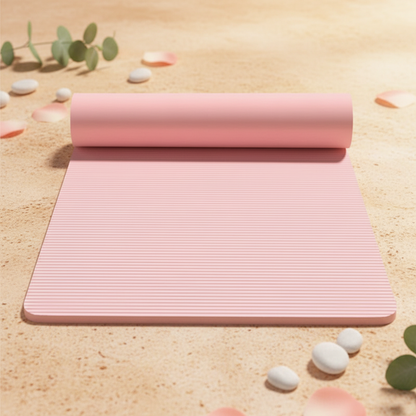 Pink yoga mat with wellness background